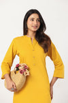 Women's Yellow Solid Straight Long Kurti