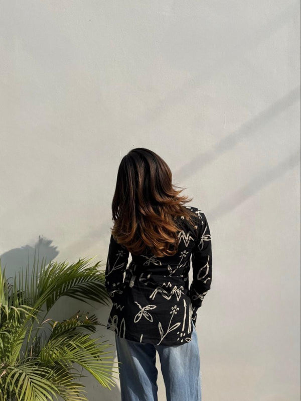 Black viscose rayon printed tunic featuring a square neckline