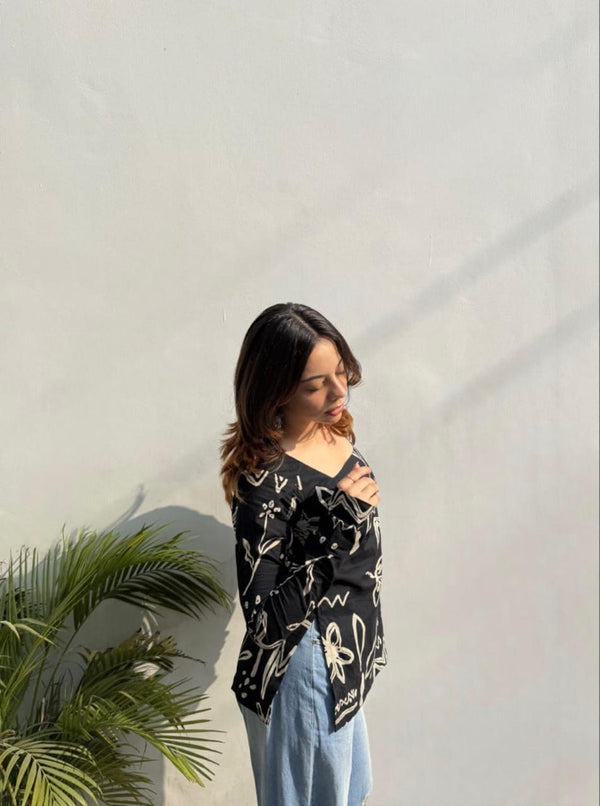 Black viscose rayon printed tunic featuring a square neckline
